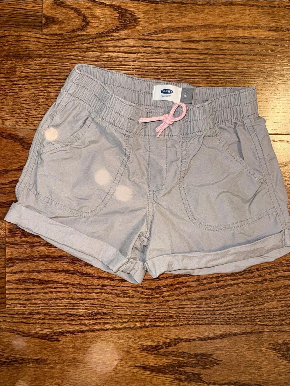 Size 8/M girls bundle of 3pull-on shorts from Old Navy. Pink, gray, khaki.